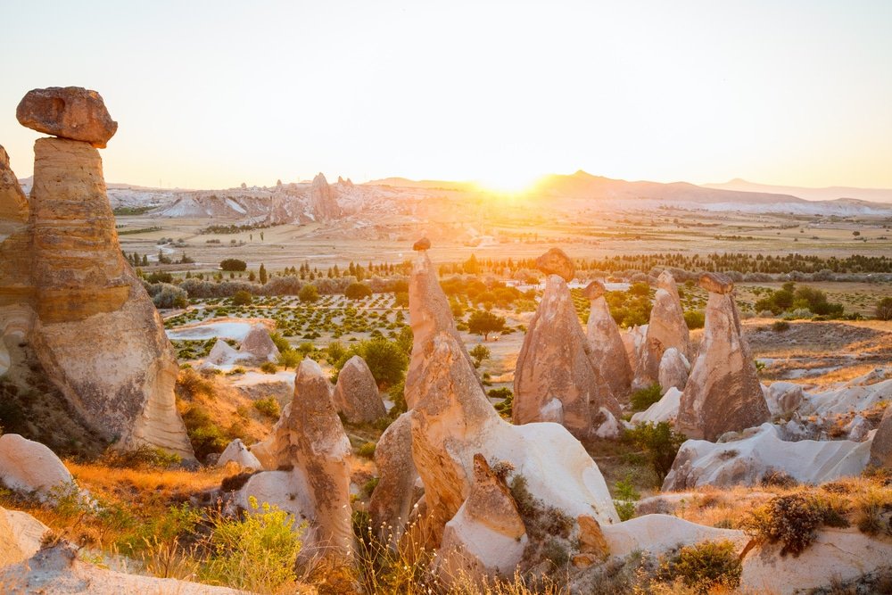 Beautiful sunset view of valley near Cavusin village in Cappadocia - a truer natural wonder of Türkiye