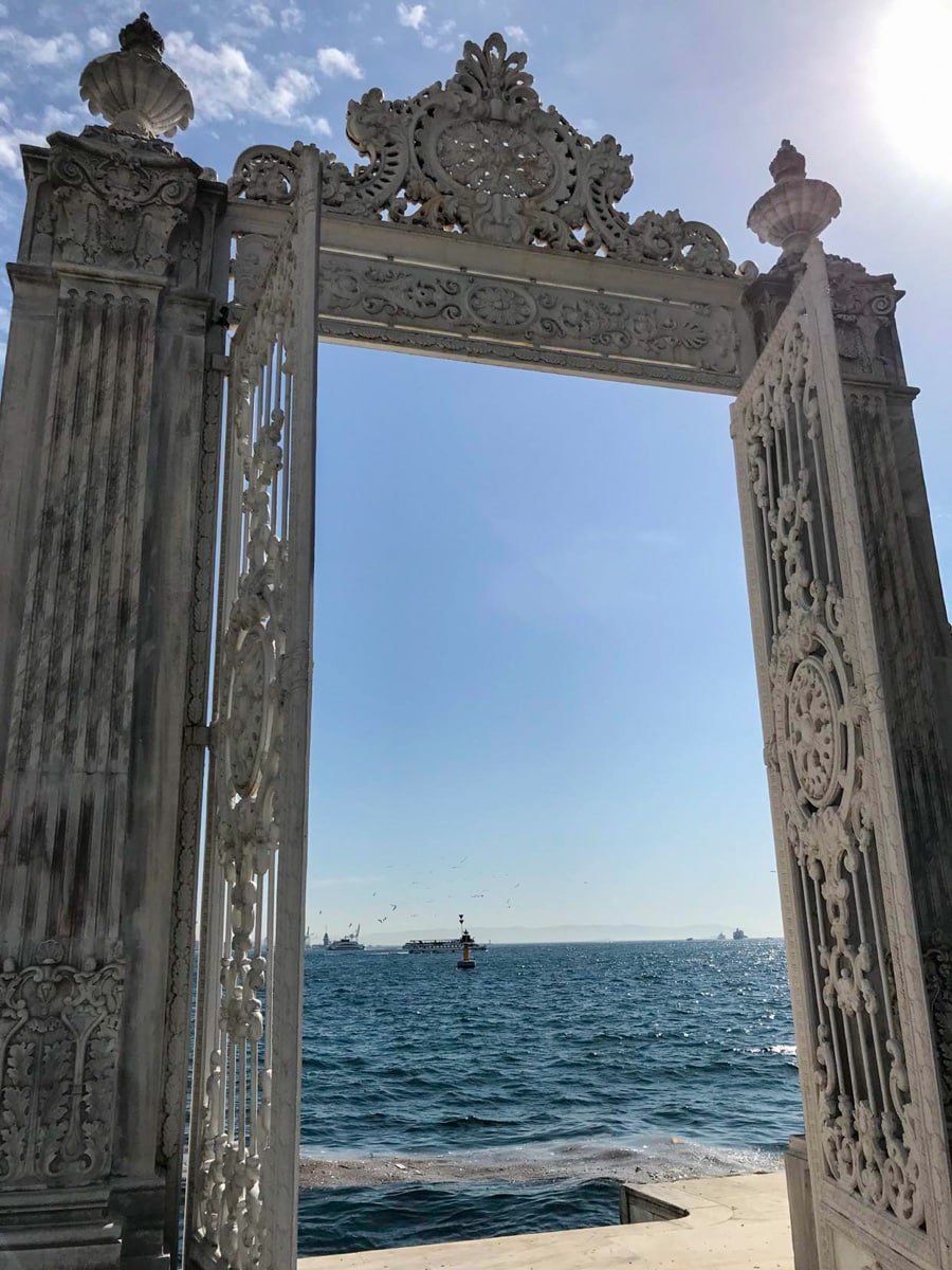 Dolmabahce Palace ornate gate leading to the water.