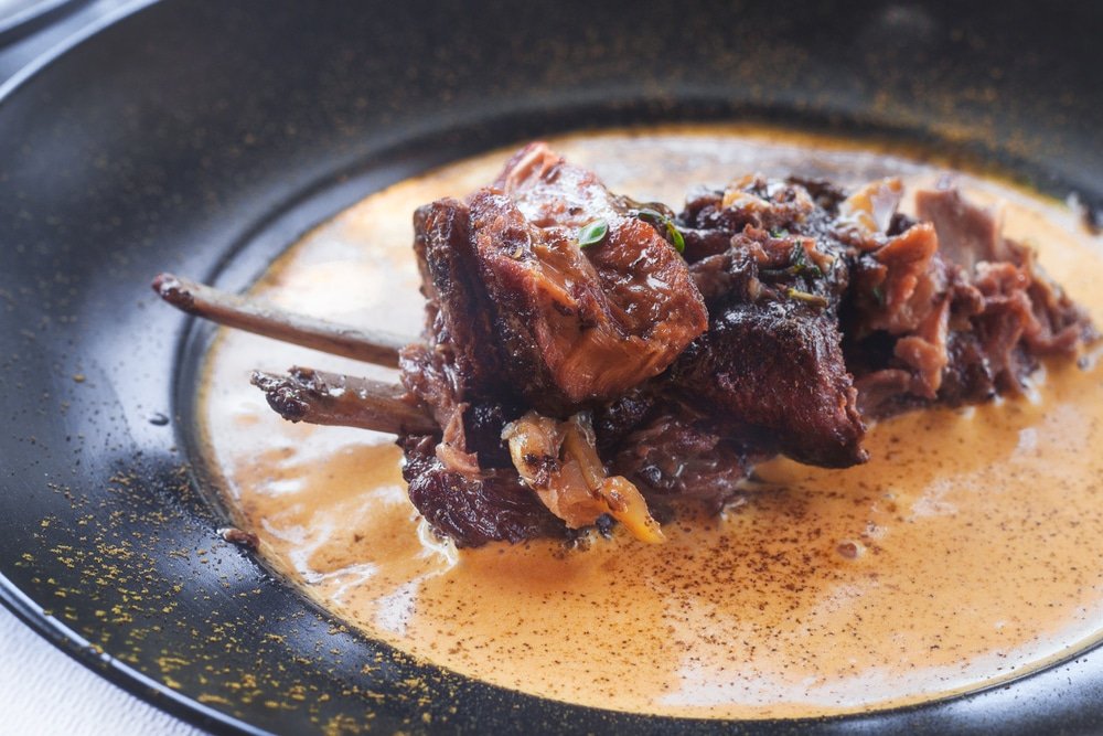 Traditional Naxian slow cooked goat meat with spicy carrots- totally worth visiting in Naxos.